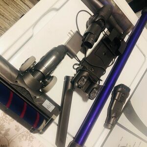 Dyson Cordless Vacuum with Purple and Gray Accents